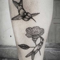 Black and white original design hummingbirds and hibiscus flower tattoo on leg