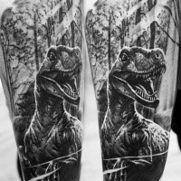 Black and white realism style dinosaur tattoo on thigh