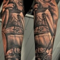 Black and white realism style very detailed forearm tattoo of pirate sailing ship