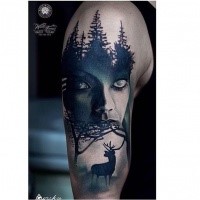 Black and white shoulder tattoo of mystical woman with dark forest