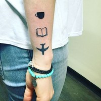 Black and white simple design cup, open book and plane forearm tattoo