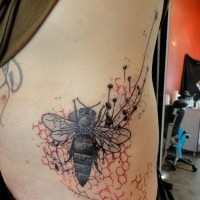 Black bee and red honeycomb tattoo on ribs by Xoil