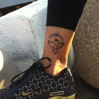 Black celtic friendship tattoo on leg