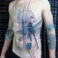 Black ink abstract style big dragonfly tattoo on chest and belly