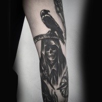 Black ink arm tattoo of Grimm reaper with crow