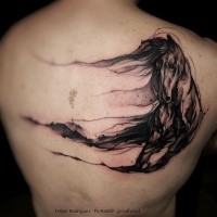 Black ink back tattoo of breathtaking horse