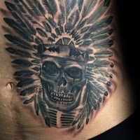 Black ink belly tattoo of Indian skull with helmet