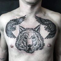 Black ink big interesting looking wolf tattoo on chest with flying crows