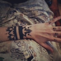 Black ink bracelet wrist tattoo by Grace Neutral
