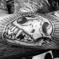Black ink dot style tattoo of animal skull