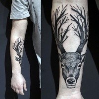 Black ink engraving style forearm tattoo of deers skull