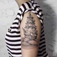 Black ink engraving style shoulder tattoo of simple sailing ship with waves