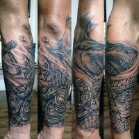 Black ink forearm tattoo of shark with treasure chest and old divers helmet