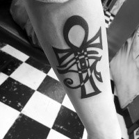 Black ink forearm tattoo of various Egypt symbols