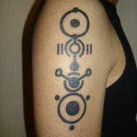 Black ink geek tattoo on shoulder for men