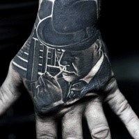 Black ink gorgeous hand tattoo of smoking mafioso