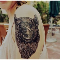 Black ink head bear tattoo on shoulder