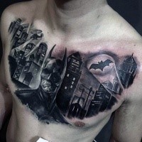 Black ink incredible looking dark Batman with city tattoo on chest