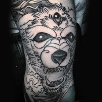 Black ink knee tattoo of demonic dog with three eyes