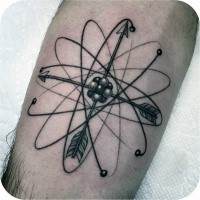 Black ink leg tattoo of arrow shaped atom