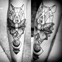 Black ink leg tattoo of unusual wolf head statue