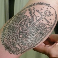 Black ink nautical tattoo on arm
