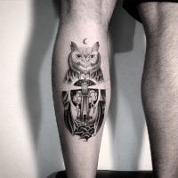 Black ink original combined leg tattoo of owl with lighthouse