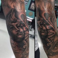 Black ink painted Egypt pharaoh statue tattoo on forearm with lettering