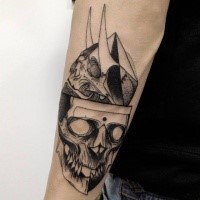 Black ink sketch style painted by Michele Zingales arm tattoo of human skulls with horns