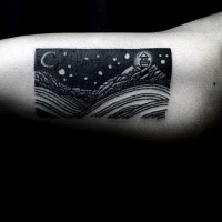 Black ink small biceps tattoo of lighthouse in mountains and moon