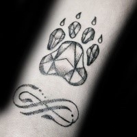 Black ink strange looking paw print with Infinity symbol