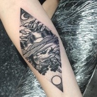 Black ink typical looking forearm tattoo of rhombus stylized with cute picture