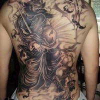 Black ink whole back tattoo of creepy man warrior with flowers