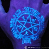Black light pentagram on the palm