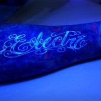Black light scripting tattoo neon style