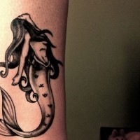 Black mermaid tattoo ideas design on leg