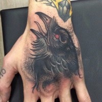 Black old crown detailed colored tattoo on hand in old style