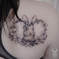 Black outline style detailed cute rabbit tattoo with flowers by Zihwa