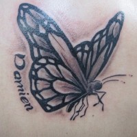 Tatuaje en la espalda, mariposa estilizada