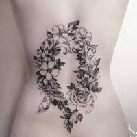 Blackwork accurate looking back tattoo of flowers by Zihwa