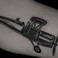 Blackwork style amazing looking tattoo of vintage plane