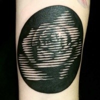 Blackwork style big circle shaped tattoo stylized with rose