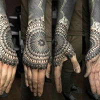 Blackwork style big forearm and hand tattoo of ornamental flower