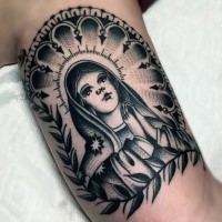 Blackwork style colored biceps tattoo of saint woman