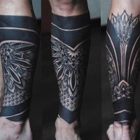 Blackwork style colored leg tattoo stylized with ornamental flowers