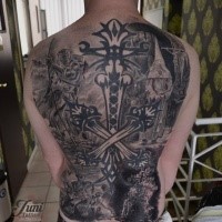 Blackwork style detailed whole back tattoo of various mystical figures with cross