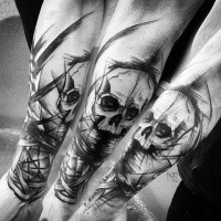 Blackwork style forearm tattoo of human skull