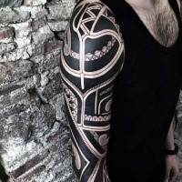 Blackwork style large sleeve tattoo of Polynesian ornaments