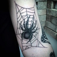 Blackwork style medium size arm tattoo of spider with web