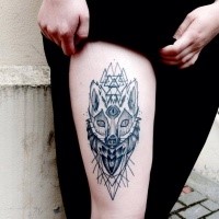 Blackwork style mystical cat with triangles tattoo on thigh